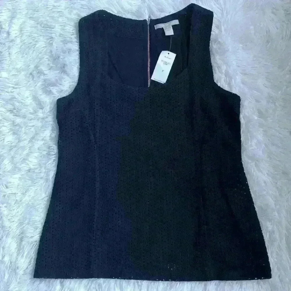 Banana Republic sleeveless top. Black with gold, zipper and back.  Size 8. NWT.